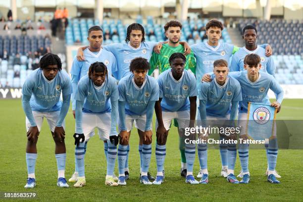 Players of Manchester City line up for a team photo prior to the UEFA Youth League 2023/24 match between Manchester City and RB Leipzig at Joie...