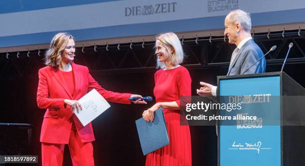 December 2023, Hamburg: Estonian Prime Minister Katja Kallas stands between presenter Julia-Niharika Sen and Janusz Reiter, former Polish Ambassador...