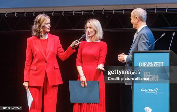 December 2023, Hamburg: Estonian Prime Minister Katja Kallas stands between presenter Julia-Niharika Sen and Janusz Reiter, former Polish Ambassador...