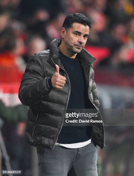 Head coach Miguel Sanchez 'Michel' of Girona FC gives his thumbs up during the LaLiga EA Sports match between Girona FC and Athletic Bilbao at...