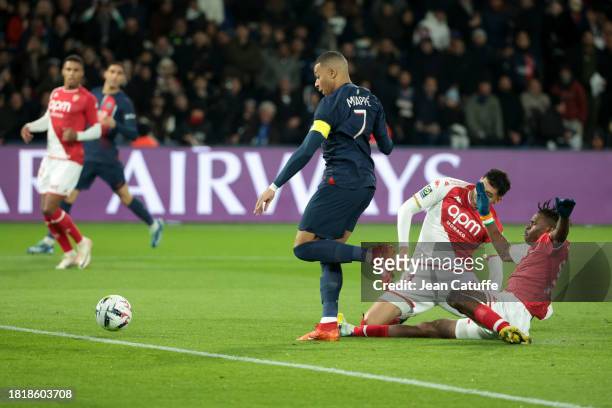 Kylian Mbappe of PSG, Wilfried Singo of Monaco in action during the Ligue 1 Uber Eats match between Paris Saint-Germain and AS Monaco at Parc des...