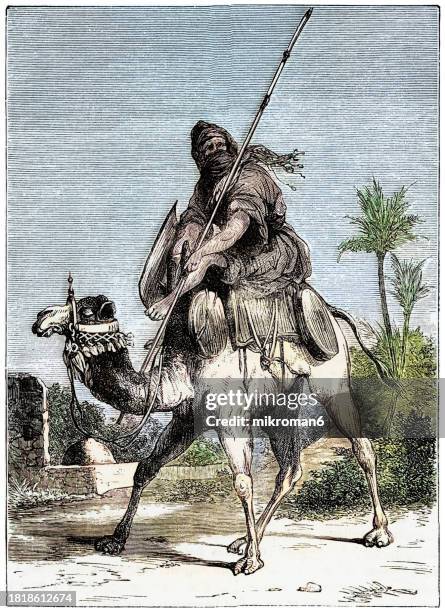 old engraving illustration of the tuareg man (twareg or touareg) a large berber ethnic group that principally inhabit the sahara in a vast area stretching from far southwestern libya to southern algeria, niger, mali, and burkina faso - tuareg stock pictures, royalty-free photos & images