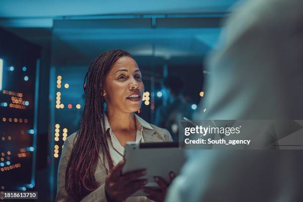 maintenance engineers in server room - network security stock pictures, royalty-free photos & images