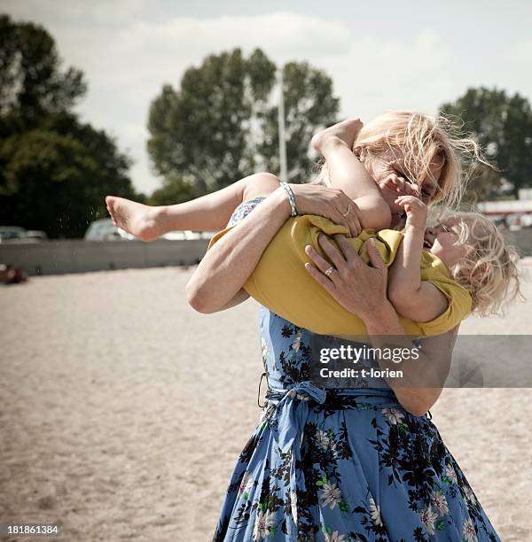 happiness - multi generation family beach stock pictures, royalty-free photos & images