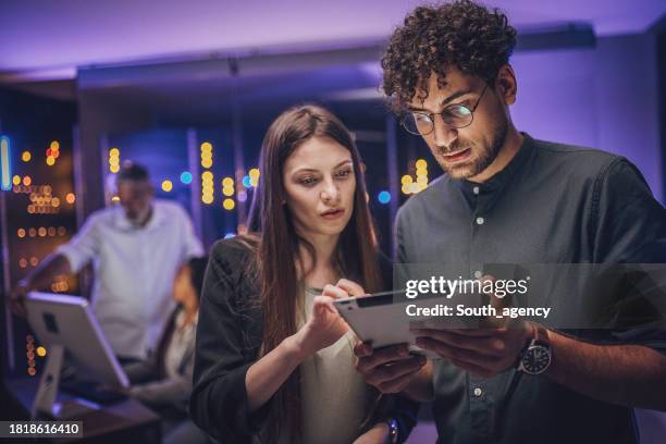 maintenance engineers in server room - cyber security people stock pictures, royalty-free photos & images