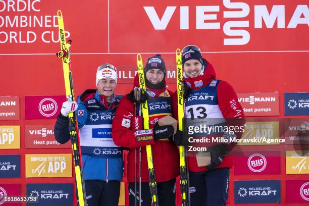 Jarl Magnus Riiber of Team Norway takes 1st place, Johannes Lamparter of Team Austria takes 2nd place, Joergen Graabak of Team Norway takes 3rd place...