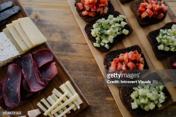 traditional armenian snacks toast with tomatoes and cucumbers and meat - armenia country stock pictures, royalty-free photos & images