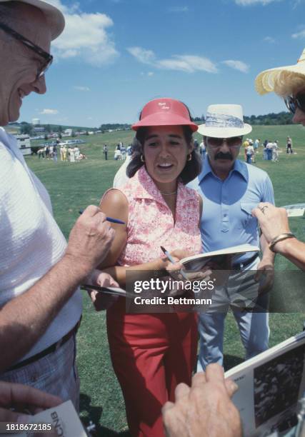 American golfer Nancy Lopez signing autographs after winning the European LPGA Championship at Sunningdale in England, August 7th 1978.