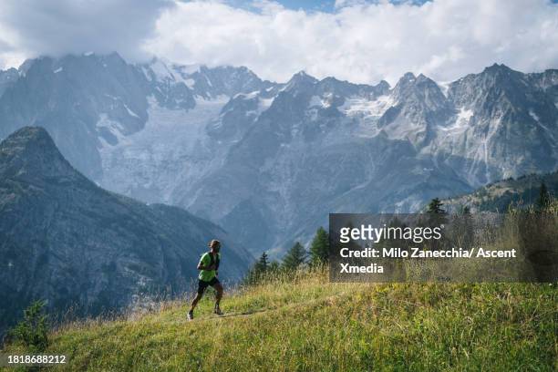 trail runner ascends mountain trail - tapered roots stock pictures, royalty-free photos & images