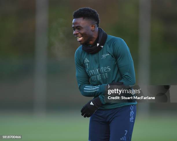 Bukayo Saka of Arsenal during a training session at Arsenal Training Ground on November 28, 2023 in London, England.