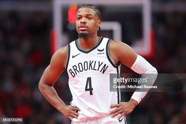 Dennis Smith Jr. #4 of the Brooklyn Nets looks on against the Chicago Bulls in the first half of the NBA In-Season Tournament at the United Center on...