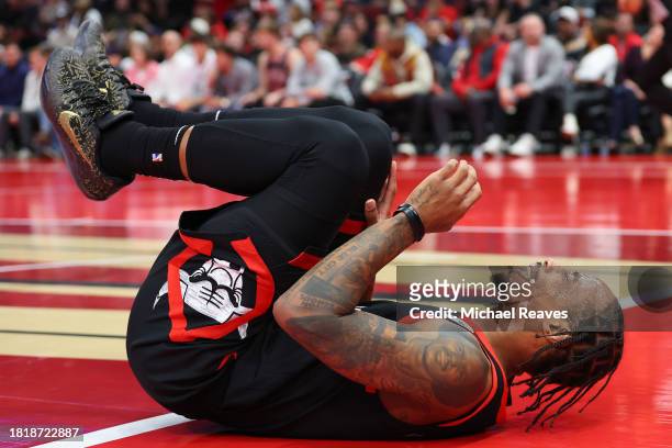 DeMar DeRozan of the Chicago Bulls reacts against the Brooklyn Nets in the first half of the NBA In-Season Tournament at the United Center on...