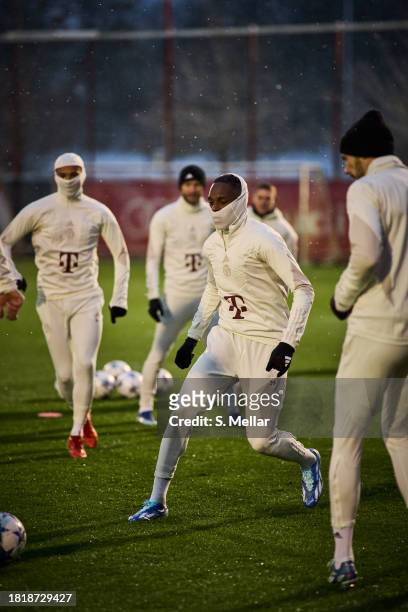 Mathys Tel and other players of FC Bayern Muenchen getting practice at the training ground at Saebener Strasse on November 28, 2023 in Munich,...