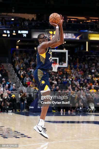 Jalen Smith of the Indiana Pacers attempts a shot in the third quarter against the Portland Trail Blazers at Gainbridge Fieldhouse on November 27,...