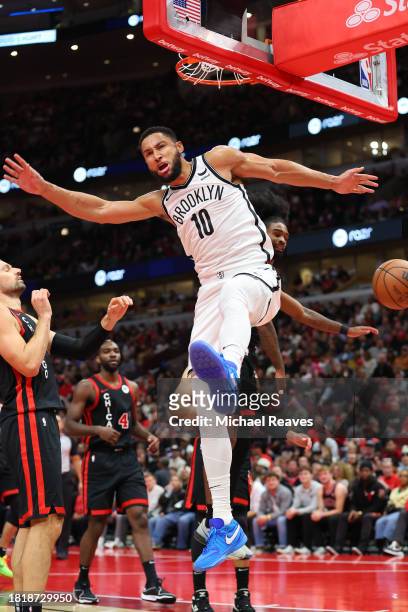 Ben Simmons of the Brooklyn Nets dunks against the Chicago Bulls in the second half of the NBA In-Season Tournament at the United Center on November...