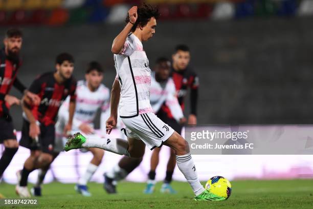 Martin Palumbo of Juventus Next Gen scores his team's first goal during the Coppa Italia Serie C match between Lucchese 1905 and Juventus Next Gen at...