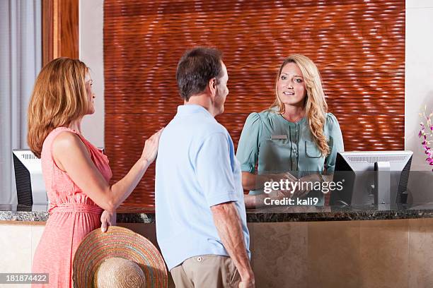 reception desk - concierge desk stock pictures, royalty-free photos & images