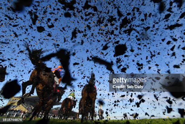 Meath , Ireland - 3 December 2023; Runners and riders clear the last during the first circuit of the Bar One Racing Porterstown Handicap Steeplechase...