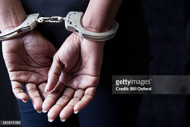 arrested - one woman only stock pictures, royalty-free photos & images