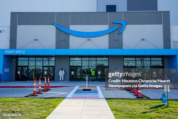 The front entrance of the Amazon HOU6 Fulfillment Center is shown on Monday, Nov. 27, 2023 in Richmond. Employees pick, pack and ship customer orders...