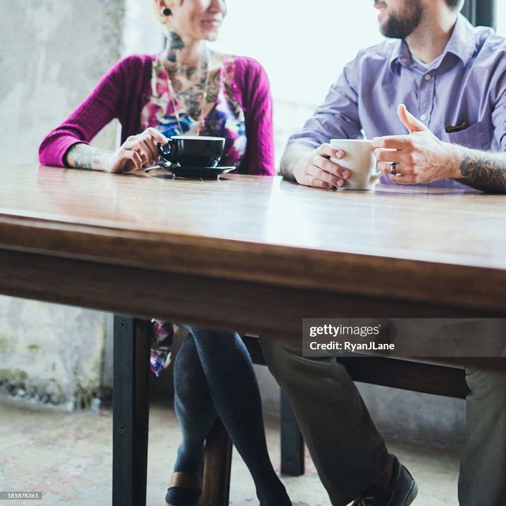 Modern Couple At Coffee Shop