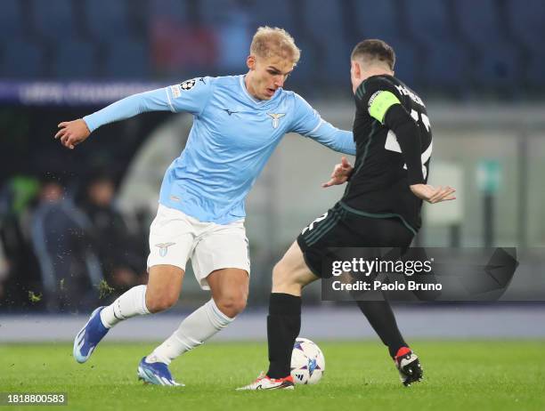 Gustav Isaksen of SS Lazio runs with the ball during the UEFA Champions League match between SS Lazio and Celtic FC at Stadio Olimpico on November...