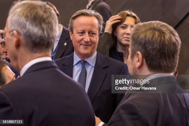David Cameron, Secretary of State for Foreign, Commonwealth and Development Affairs of the United Kingdom speaks with foreign ministers before the...
