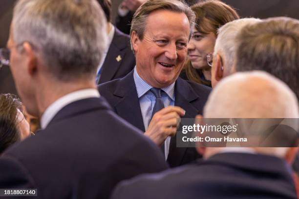 David Cameron, Secretary of State for Foreign, Commonwealth and Development Affairs of the United Kingdom speaks with foreign ministers before the...