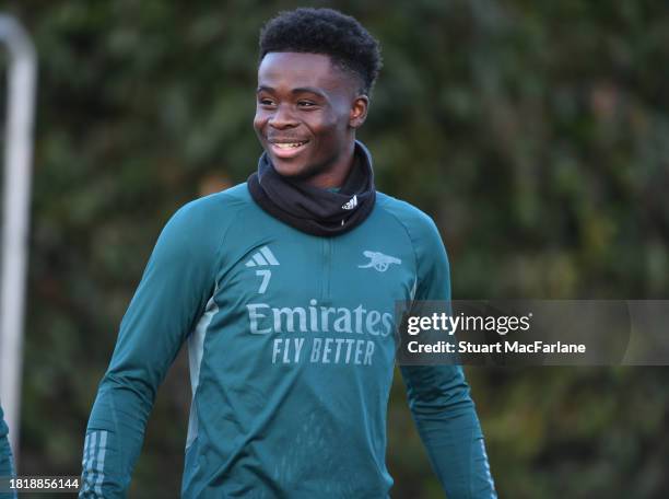 Bukayo Saka of Arsenal during a training session at Arsenal Training Ground on November 28, 2023 in London, England.