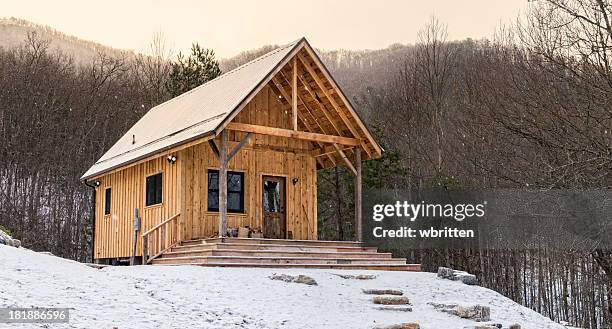 rustic appalachian cabin in snow - log cabin stock pictures, royalty-free photos & images