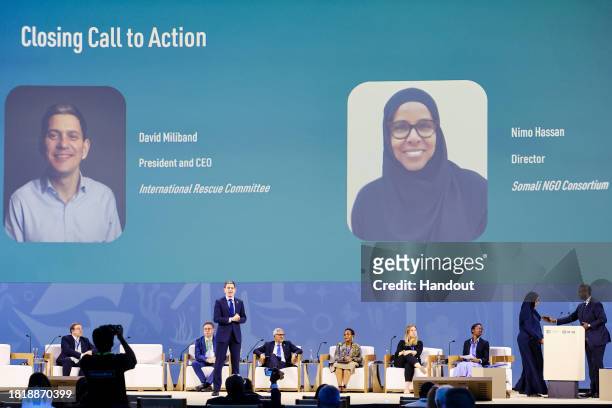 In this handout image suppled by COP28, David Miliband, President & CEO, International Rescue Committee speaks onstage at the Accelerating Climate...