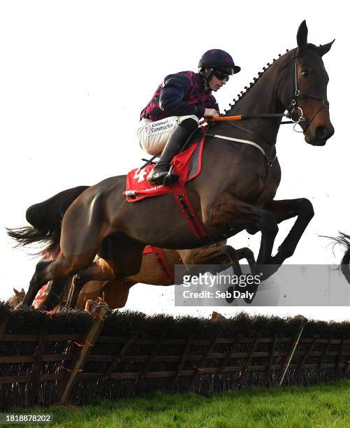 Meath , Ireland - 3 December 2023; Farren Glory, with Jack Kennedy up, jumps the second on their way to winning the Bar One Racing Royal Bond Novice...
