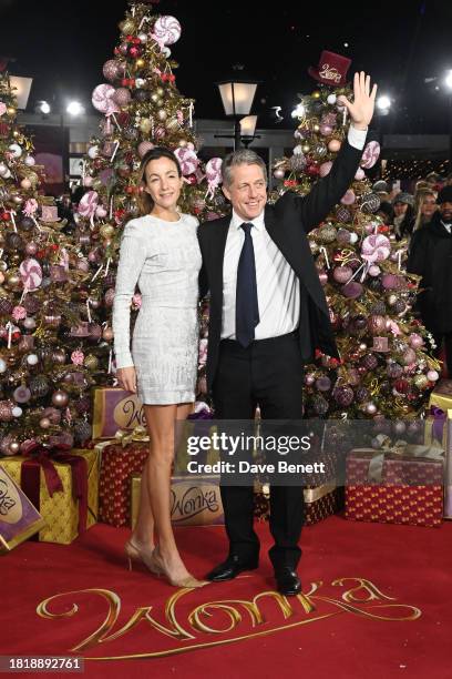 Anna Elisabet Eberstein and Hugh Grant attend the World Premiere of "Wonka" at The Royal Festival Hall on November 28, 2023 in London, England.