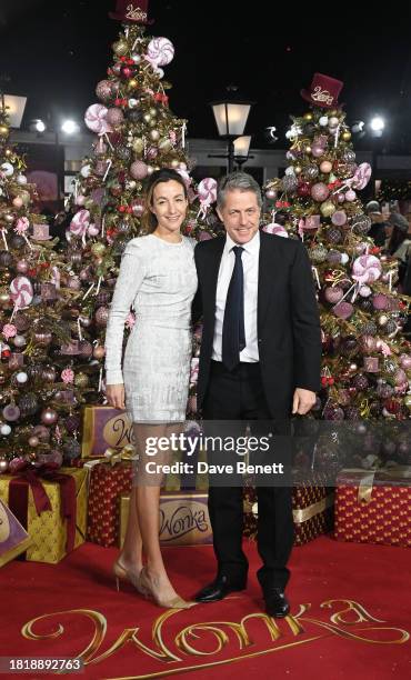 Anna Elisabet Eberstein and Hugh Grant attend the World Premiere of "Wonka" at The Royal Festival Hall on November 28, 2023 in London, England.