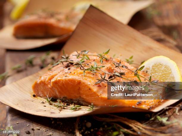 cedar wrapped salmon - baked salmon stock pictures, royalty-free photos & images