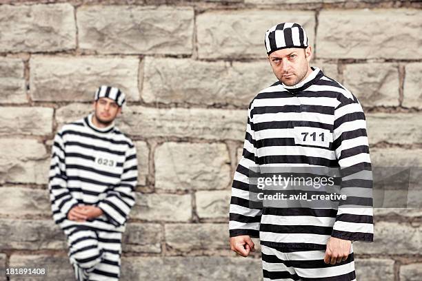 prison inmates - prison uniform stock pictures, royalty-free photos & images