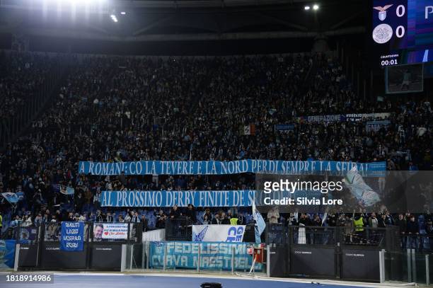 Lazio fans show a banner during the UEFA Champions League match between SS Lazio and Celtic FC at Stadio Olimpico on November 28, 2023 in Rome, Italy.