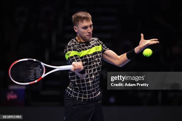 Hamad Medjedovic of Serbia plays a forehand against Alex Michelsen of United States during the Men's Singles Group Stage match on day one of the Next...