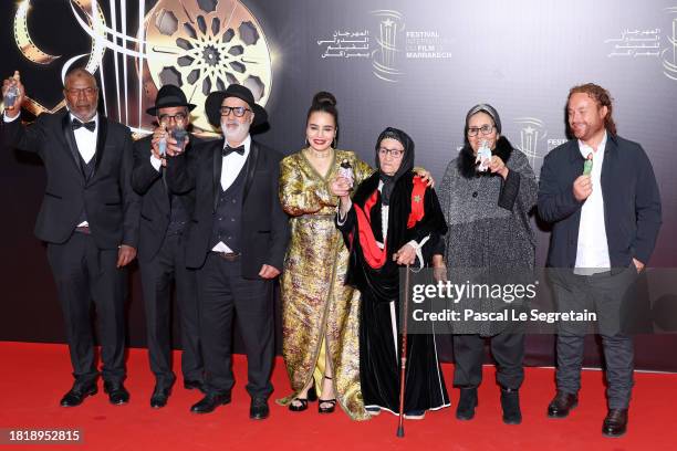 Said Masrour, Abdallah Ez Zouid, Mohamed El Moudir, Asmae El Moudir, Zahra Jeddaoui, Ouardia Zorkani and Hatem Nechi of the movie "The Mother of All...