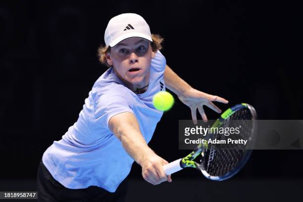 Alex Michelsen of United States plays a backhand against Hamad Medjedovic of Serbia during the Men's Singles Group Stage match on day one of the Next...