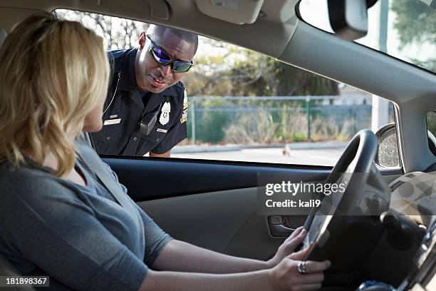 woman pulled over by police - pulled over by police stock pictures, royalty-free photos & images