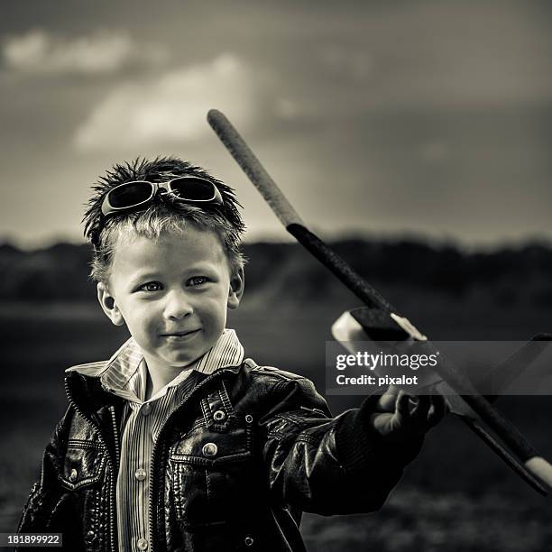 boy with model air plane - pixalot stock pictures, royalty-free photos & images