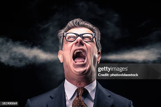 shouting businessman with steam jets blowing out of his ears - frustrated business person stock pictures, royalty-free photos & images