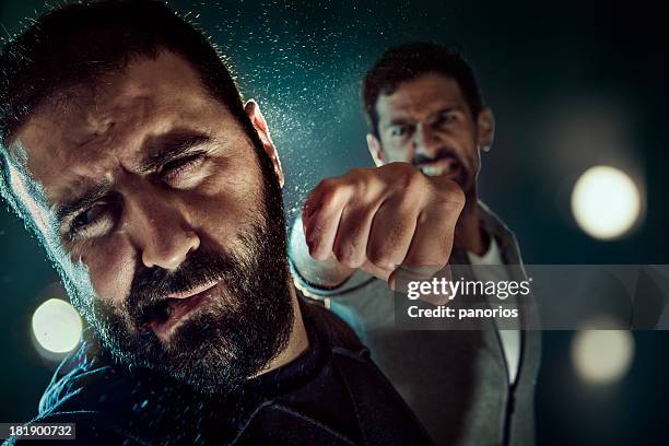 punching - fighting stock pictures, royalty-free photos & images