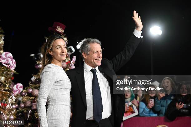 Anna Elisabet Eberstein and Hugh Grant attend the Warner Bros. Pictures World Premiere of "Wonka" at The Royal Festival Hall on November 28, 2023 in...