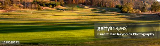 golf at sunset - the hills golf club stock pictures, royalty-free photos & images