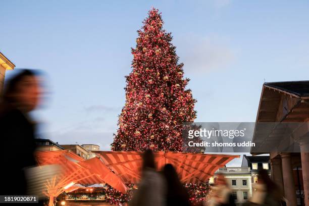 christmas celebration in london west end - tradition town square stock pictures, royalty-free photos & images