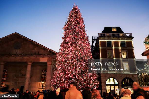 christmas celebration in london west end - tradition town square stock pictures, royalty-free photos & images