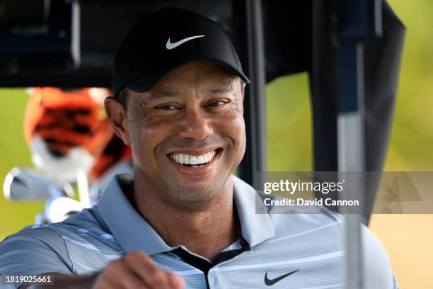 Tiger Woods of The United States sits on his golf cart during practice as a preview for the Hero World Challenge at Albany Golf Course on November...