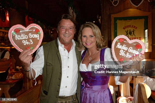 Georg Dingler and his wife Martina Dingler attend the 'Radio Gong Wiesn' as part of the Oktoberfest beer festival at Weinzelt at Theresienwiese on...